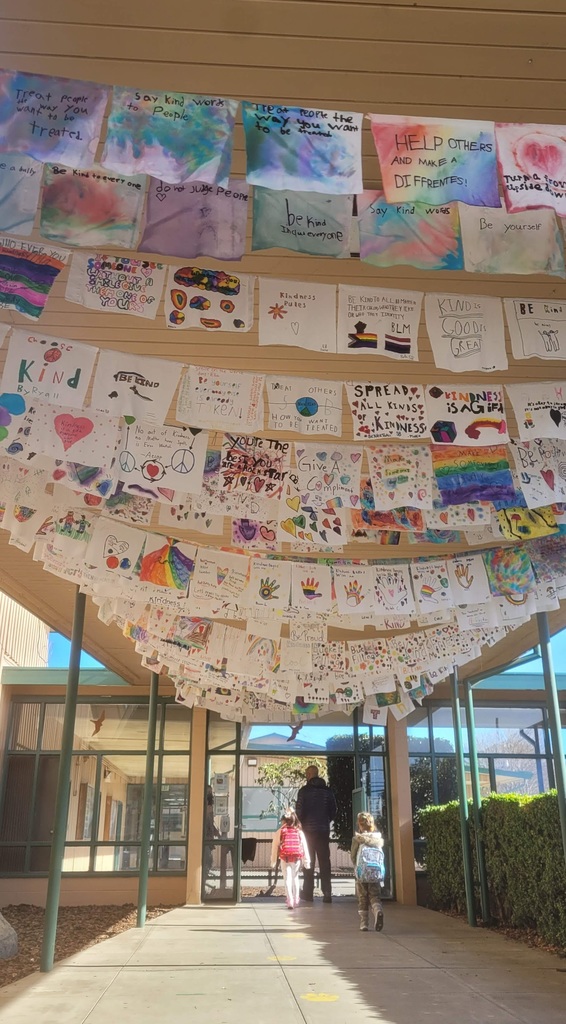 The Pacific Union entryway with colorful kid-decorated cloth squares that contain messages about kindness.